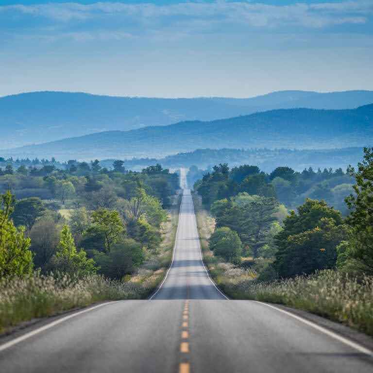 A road leading into the horizon, symbolizing the journey ahead after closing content gaps.